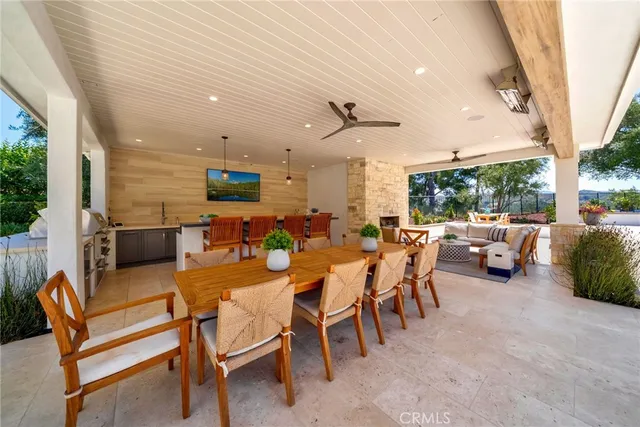 a view of a street with a building and trees in the background
