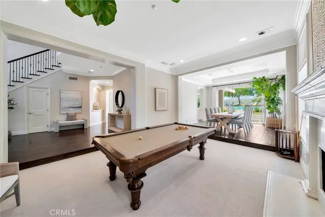 a view of a patio with couches chairs and potted plants