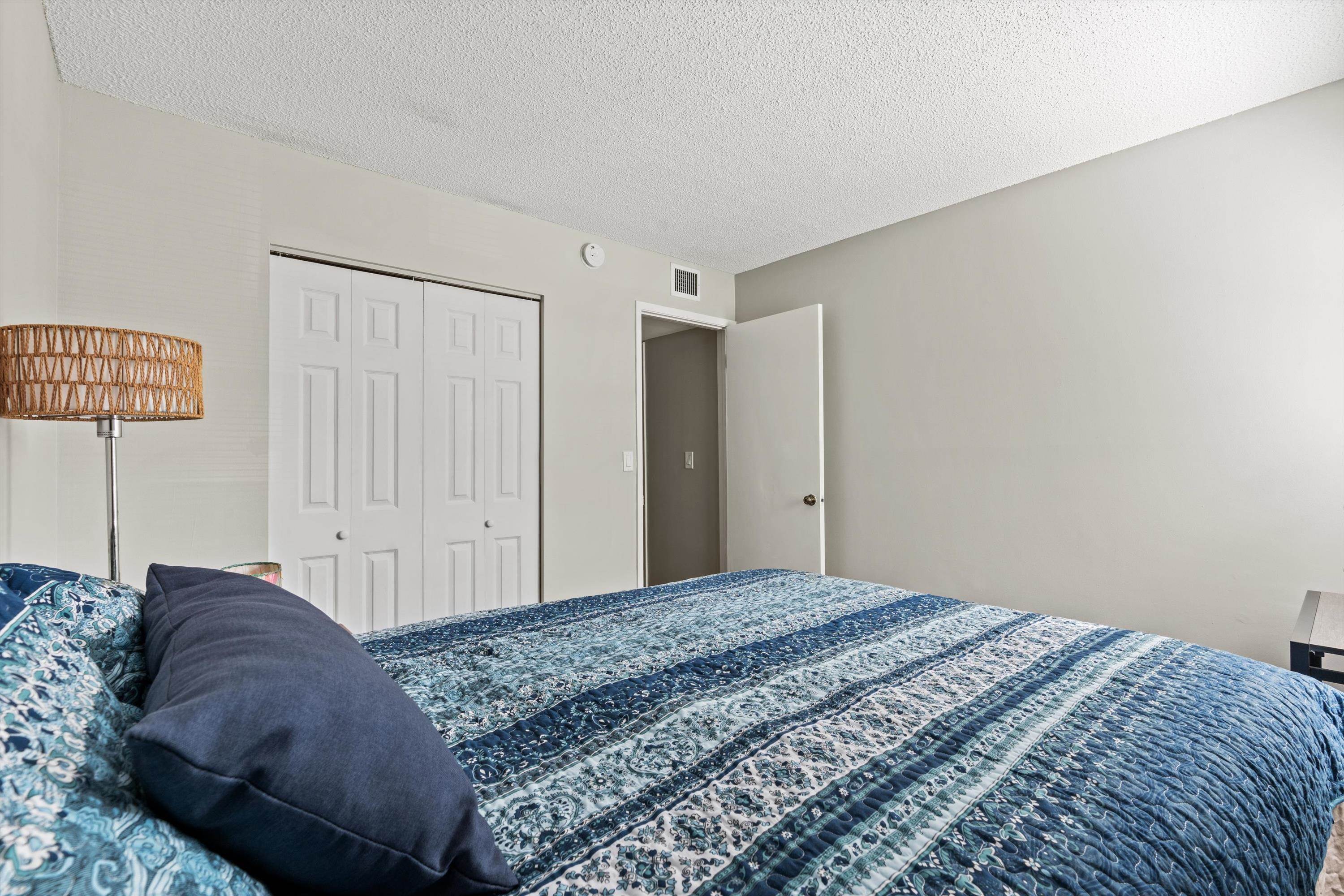 13 Alcira Court St. Augustine, FL 32086 - Photo 15 of 26 Bedroom with a textured ceiling and a closet