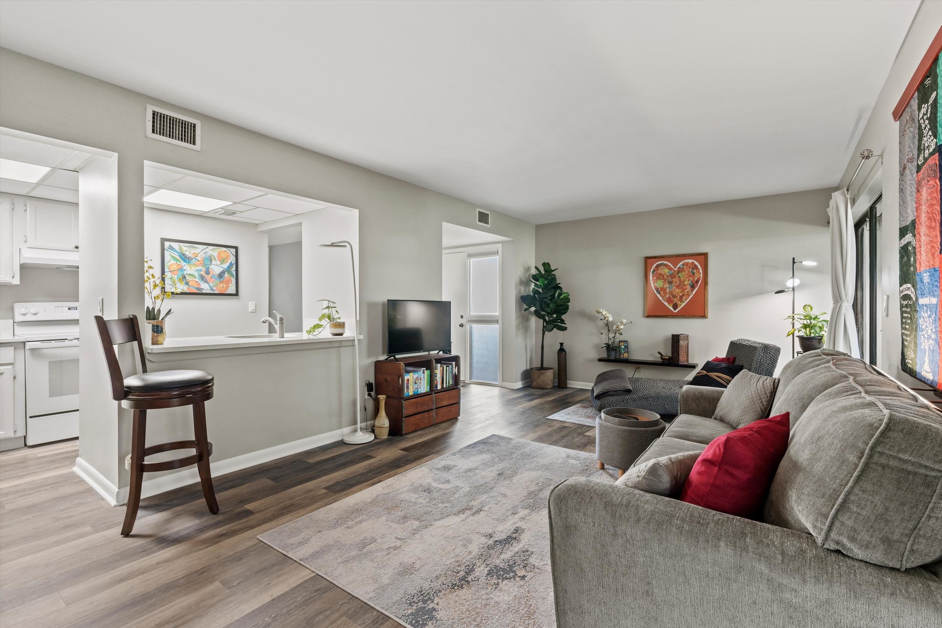 13 Alcira Court St. Augustine, FL 32086 - Photo 7 of 26 Living room with wood finished floors and baseboards