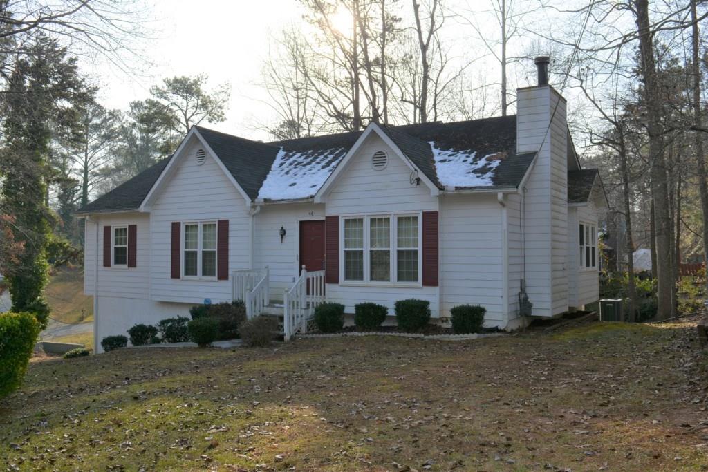 46 King Charles Road Dallas, GA 30157 - Photo 1 of 1 a front view of a house with garden