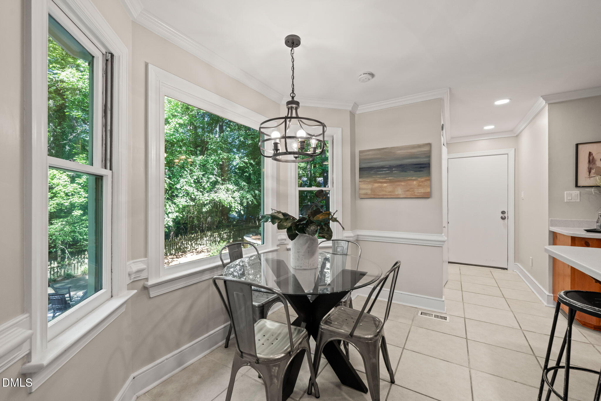 18 Strawberry Ridge Lane Durham, NC 27713 - Photo 14 of 59 a view of a dining room with furniture window and outside view