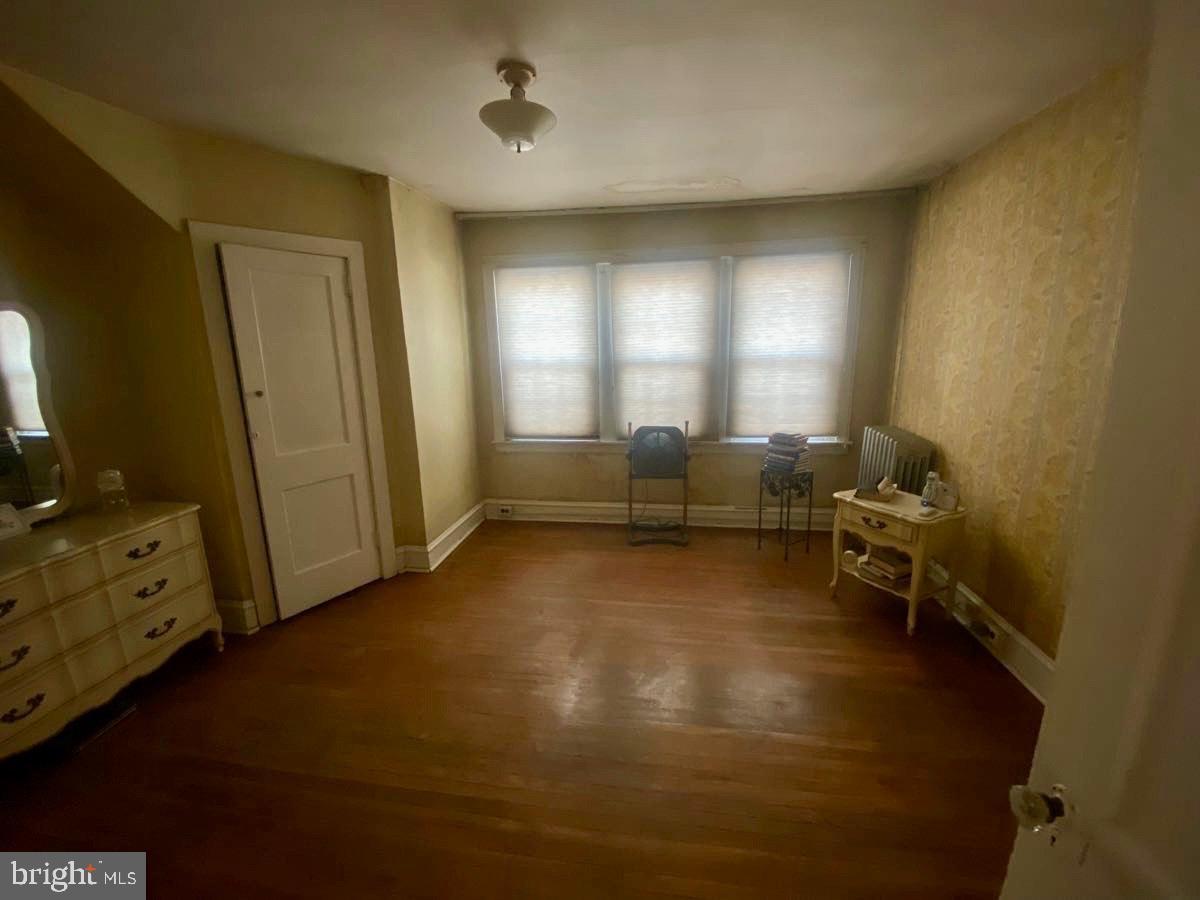 3134 Stirling Street Philadelphia, PA 19149 - Photo 11 of 17 a living room with furniture and a window