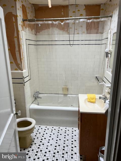 3134 Stirling Street Philadelphia, PA 19149 - Photo 16 of 17 a bathroom with a bathtub a toilet and a shower