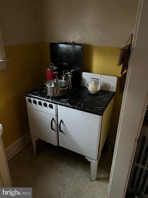 3134 Stirling Street Philadelphia, PA 19149 - Photo 8 of 17 a close view of stove and microwave