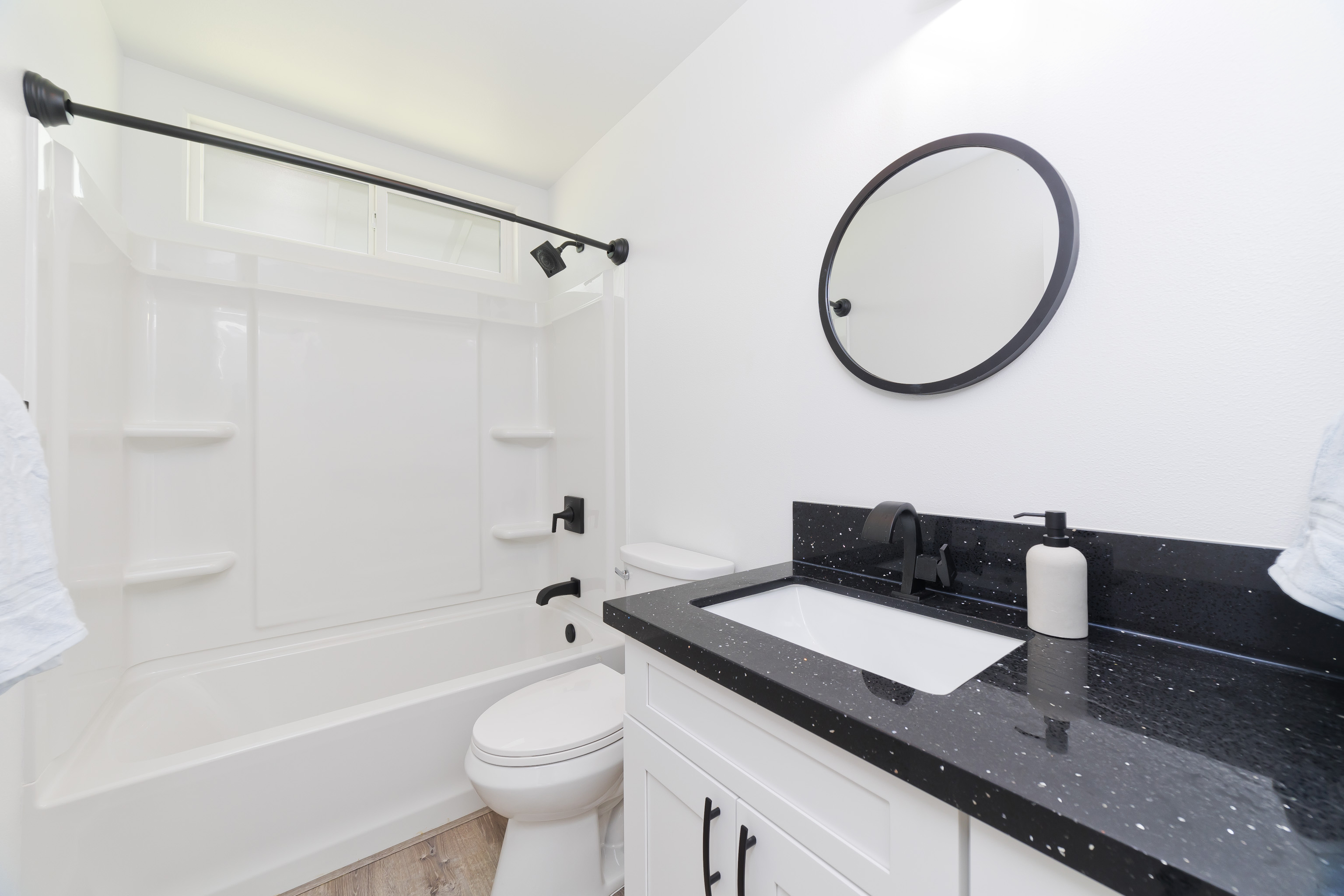 99-2016 Pukeawe Circle Volcano, HI 96785 - Photo 9 of 28 a bathroom with a sink a toilet and a bathtub