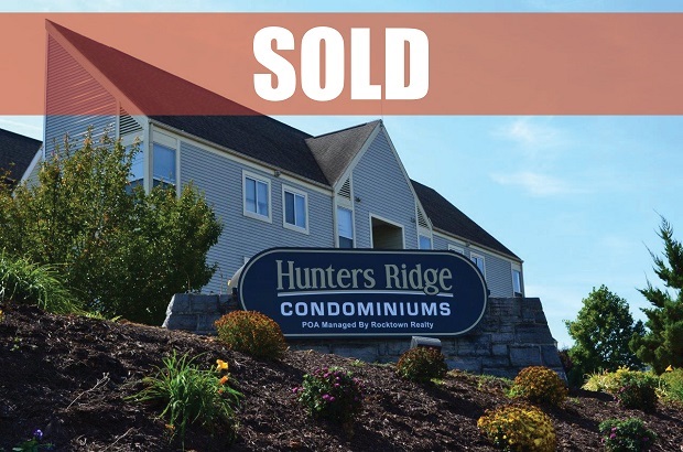 a sign on the side of a building