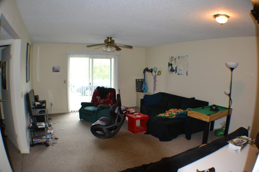 1372 Hunters Road, Unit B Harrisonburg, VA 22801 - Photo 11 of 22 a room with furniture and a window