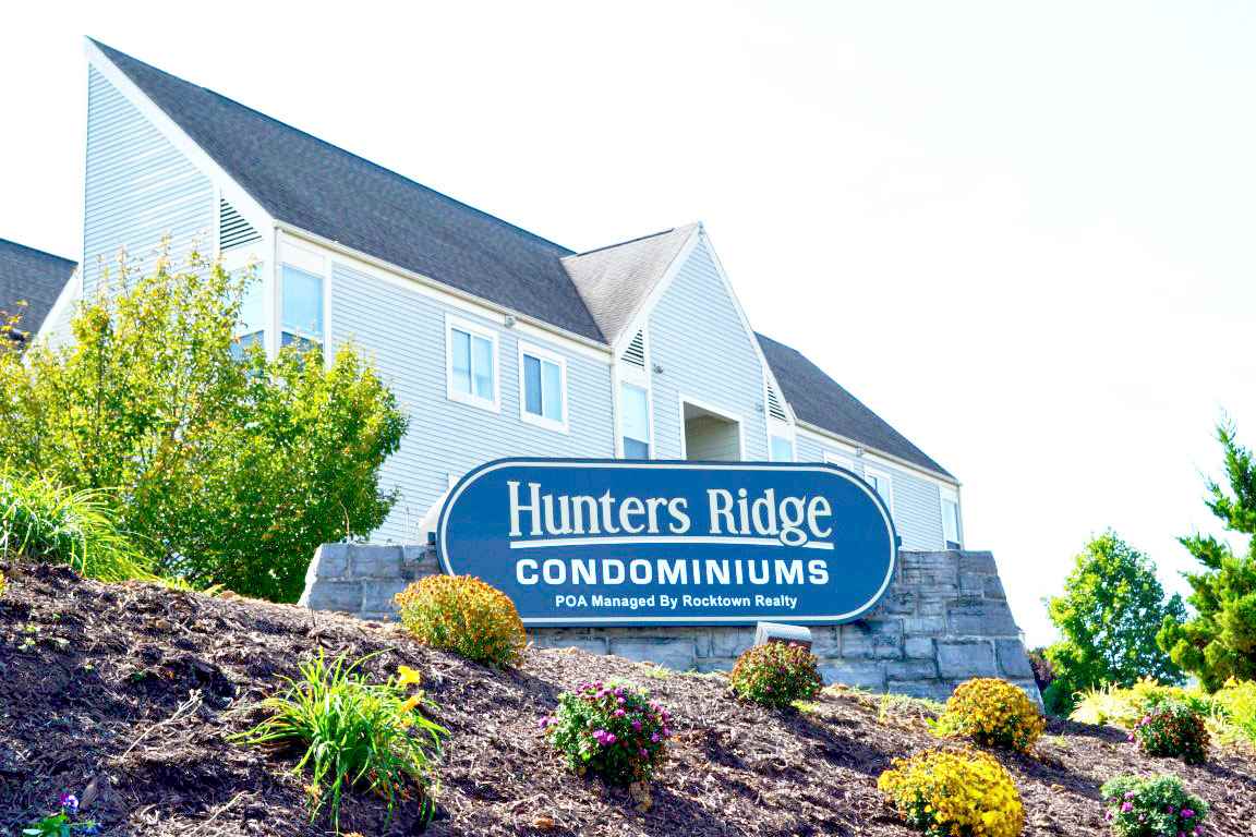 1372 Hunters Road, Unit B Harrisonburg, VA 22801 - Photo 20 of 22 a sign on the side of a building