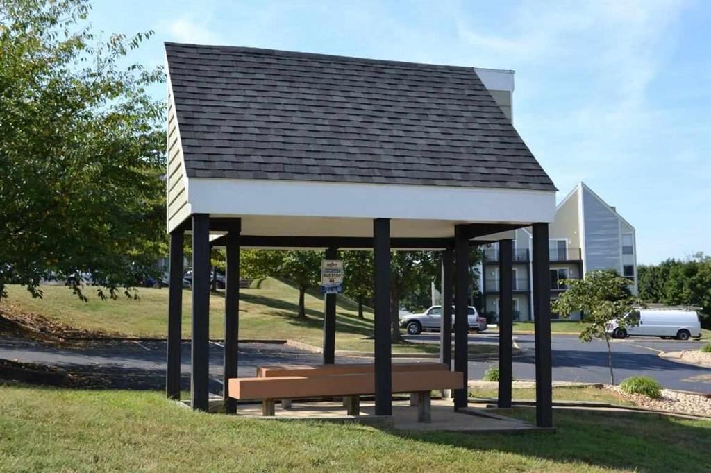 1372 Hunters Road, Unit B Harrisonburg, VA 22801 - Photo 22 of 22 a backyard of a house with table and chairs