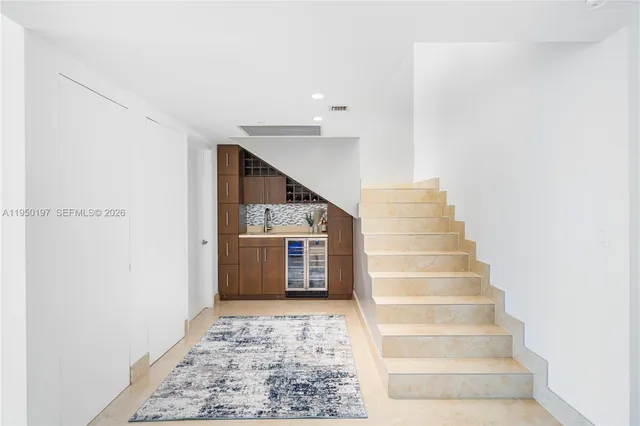 a view of an entryway with staircase