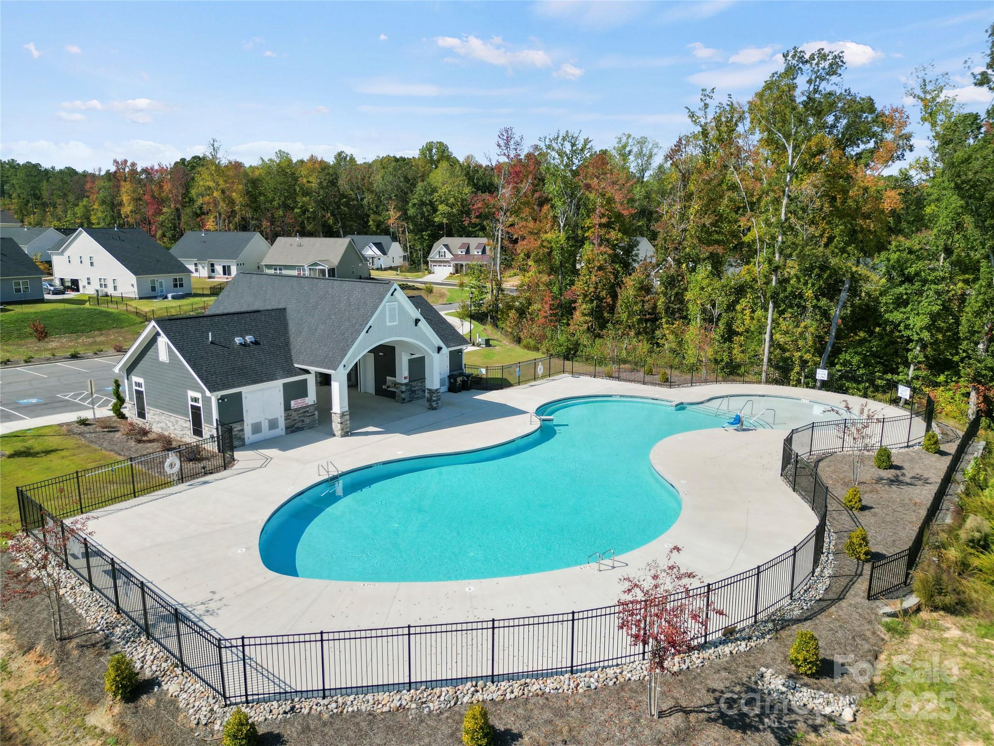 6514 Alanbrook Road Charlotte, NC 28215 - Photo 36 of 36 a view of a swimming pool with a yard