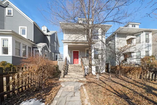 a view of a building with a bench