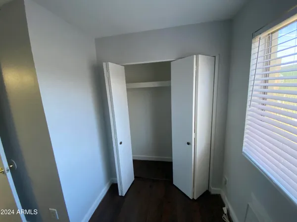 a view of a door and a window