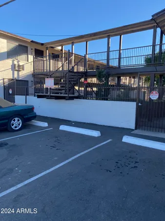 a view of a living room and entryway