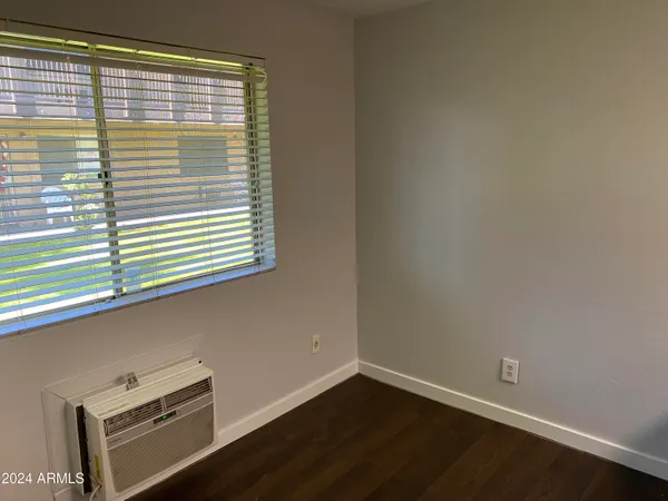 a view of a room that has a window in it