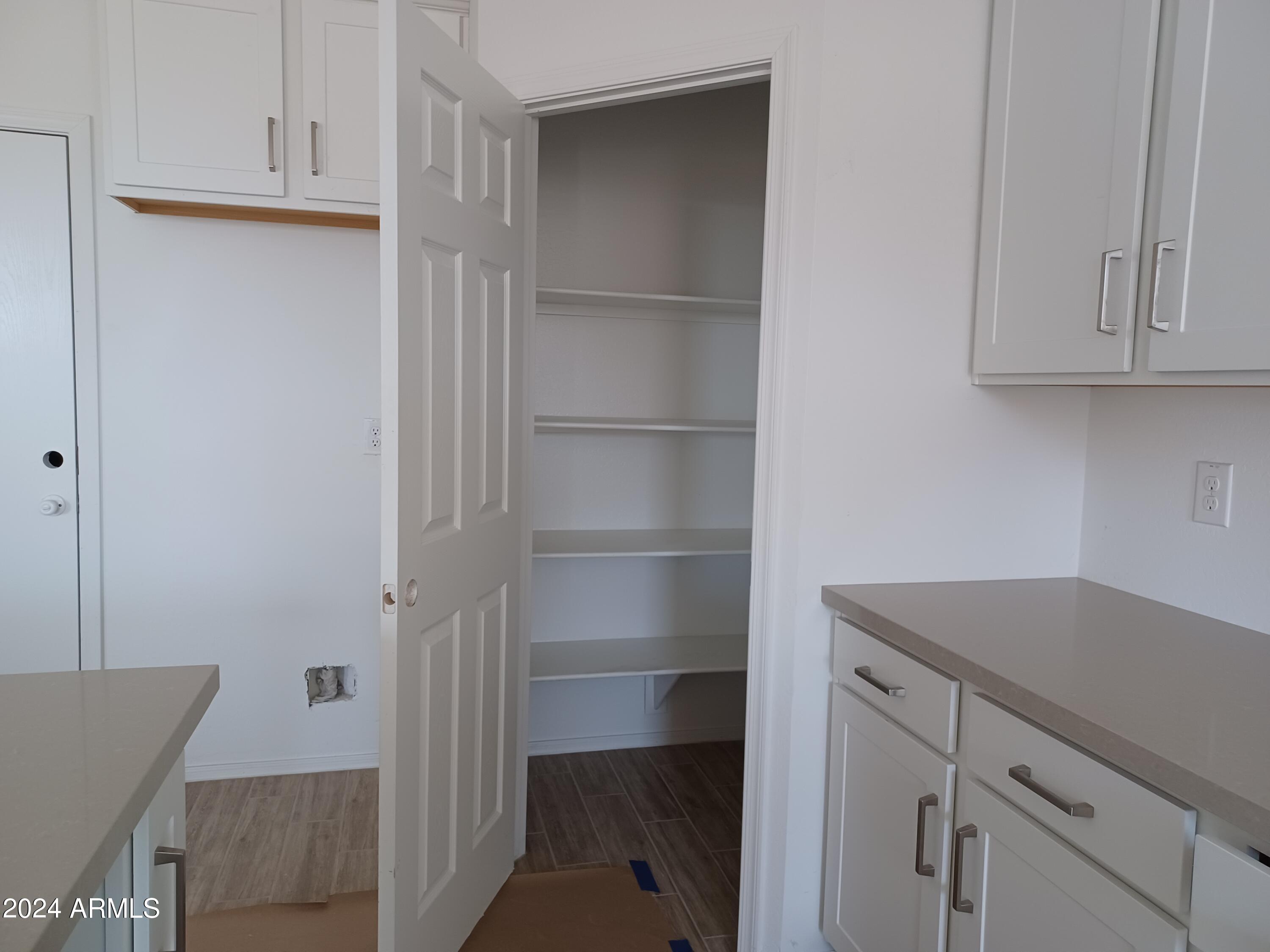 24089 West Pecan Road Buckeye, AZ 85326 - Photo 23 of 33 013 Kitchen Pantry
