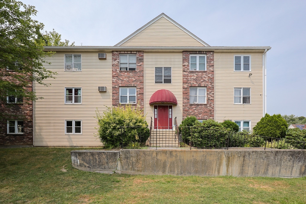 10 Nuttall Lane, Unit 1 Worcester, MA 01604 - Photo 1 of 28 front view of a house with a yard
