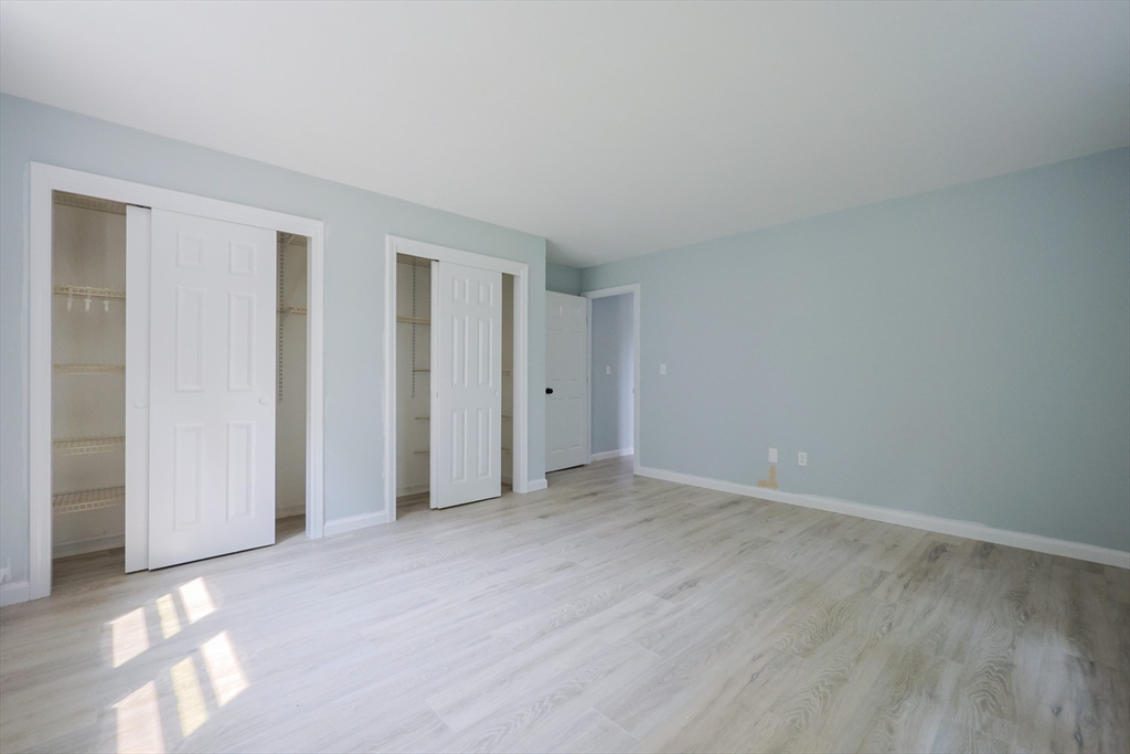 10 Nuttall Lane, Unit 1 Worcester, MA 01604 - Photo 15 of 28 a view of an empty room with wooden floor