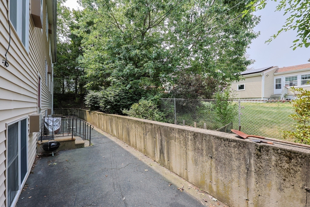10 Nuttall Lane, Unit 1 Worcester, MA 01604 - Photo 21 of 28 a view of balcony with furniture and trees