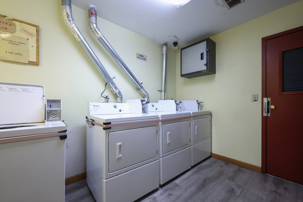10 Nuttall Lane, Unit 1 Worcester, MA 01604 - Photo 28 of 28 a utility room with dryer and washer