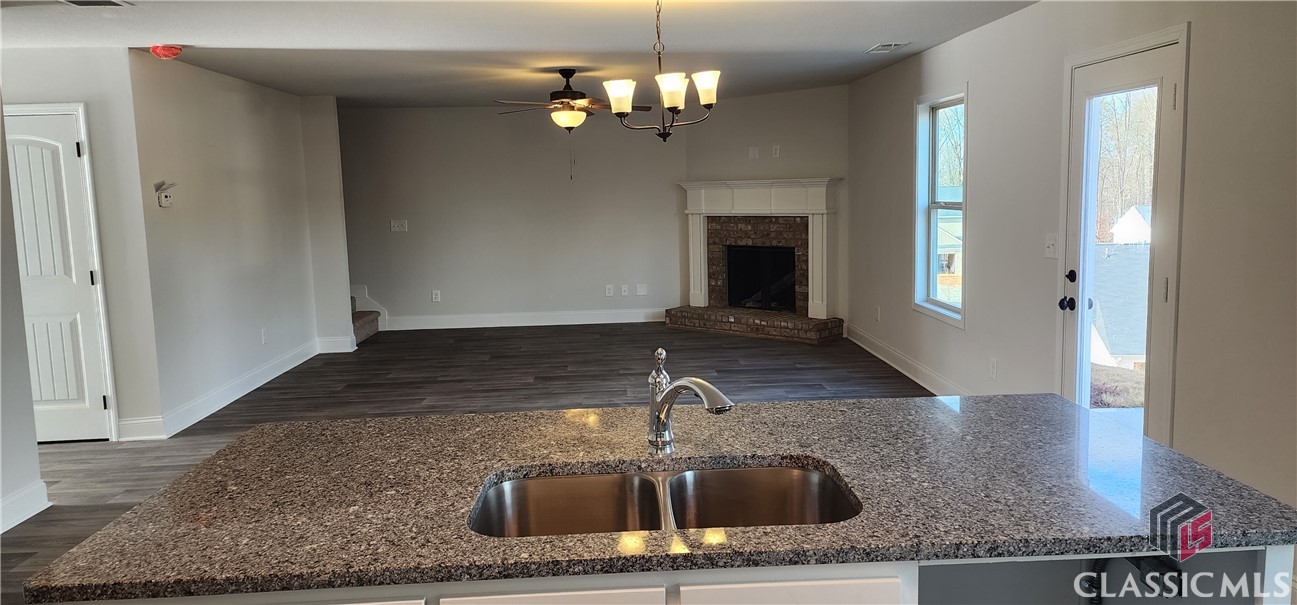 116 Suwannee Way, Unit 266 Jefferson, GA 30549 - Photo 8 of 26 Sink and dishwasher
in Island