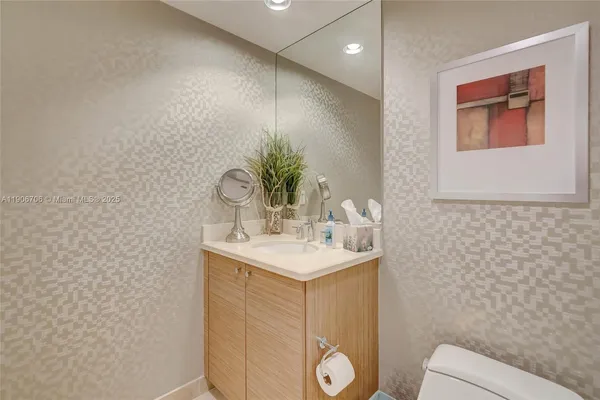 a bathroom with a shower and toilet
