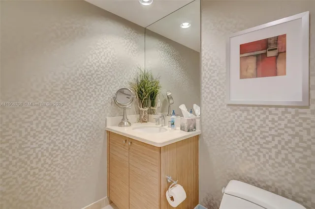 a bathroom with a shower and toilet