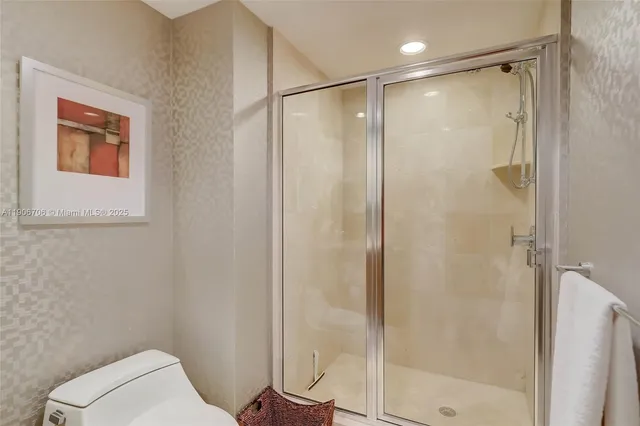 a utility room with sink dryer and washer