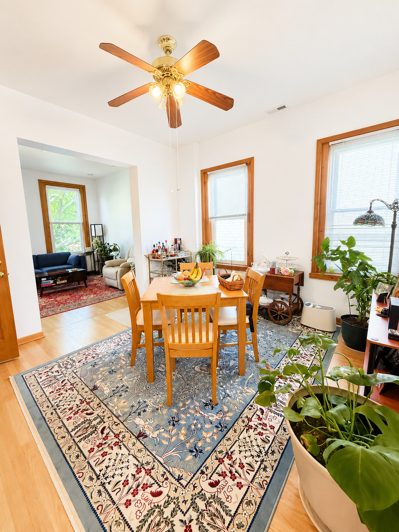 921 South Bishop Street, Unit 2 Chicago, IL 60607 - Photo 7 of 14 a view of a dining room with furniture