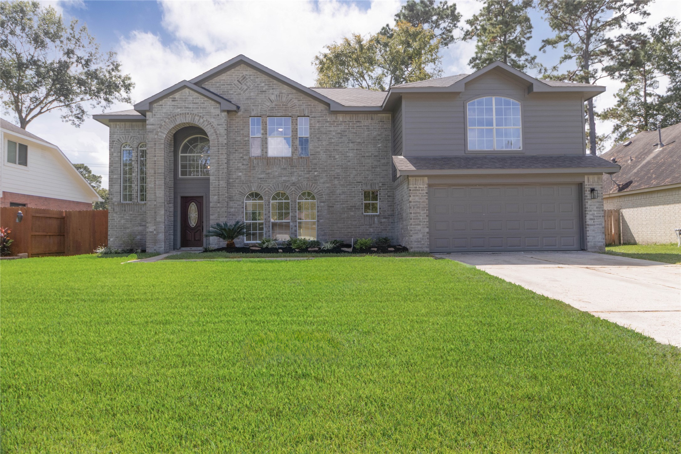 415 Binnacle Way Crosby, TX 77532 - Photo 1 of 50 a front view of a house with a garden and yard