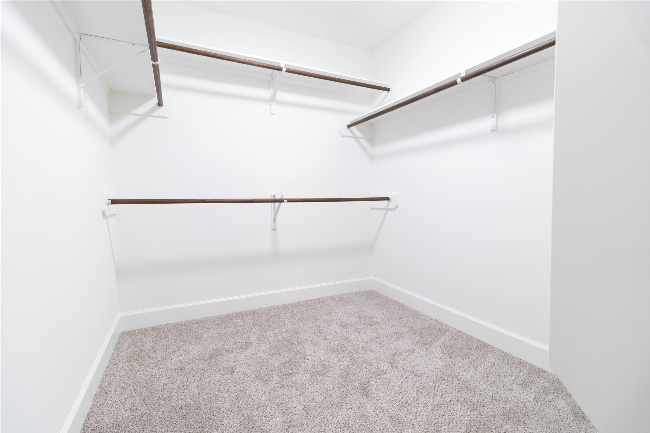 415 Binnacle Way Crosby, TX 77532 - Photo 21 of 50 a view of an empty walk in closet