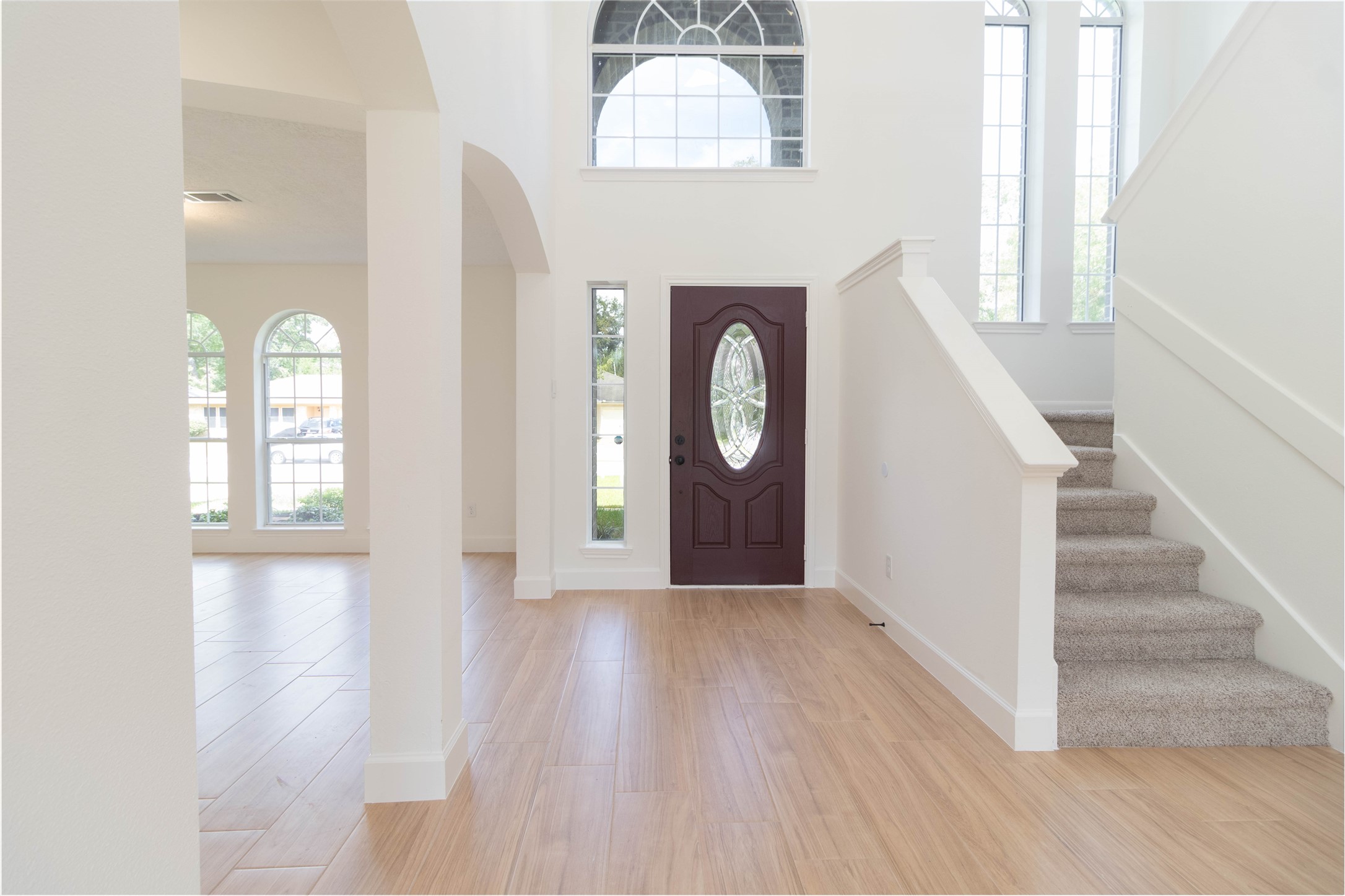 415 Binnacle Way Crosby, TX 77532 - Photo 6 of 50 a view of an entryway with wooden floor and a window