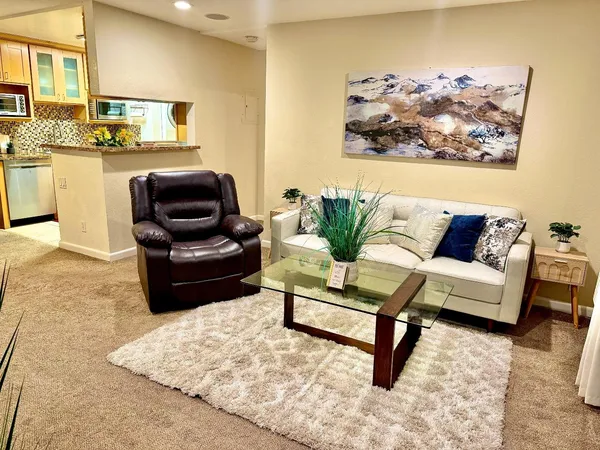a living room with furniture and a couch