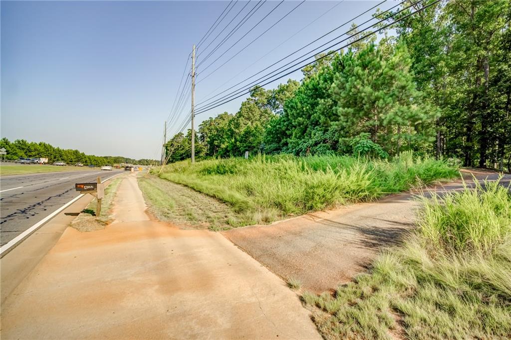 0 Highway 92 Acworth, GA 30102 - Photo 12 of 15 a view of a yard with wooden fence