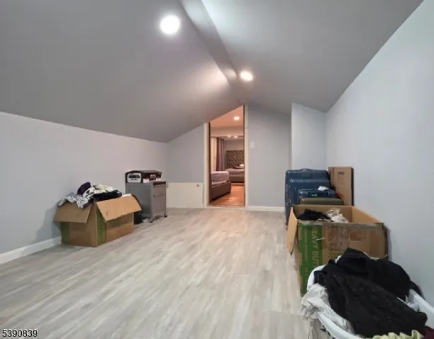 a room with furniture and a wooden floor