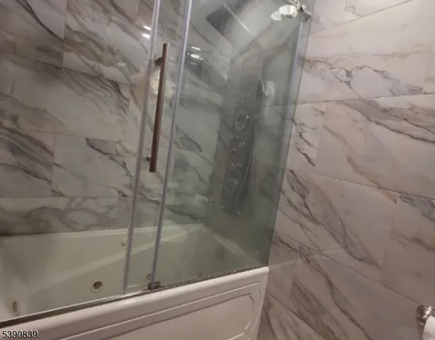 a bathroom with a bathtub