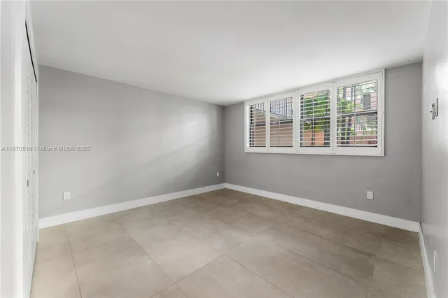 an empty room with a window