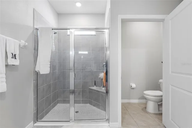 a hallway with painting on the wall and a wall painting