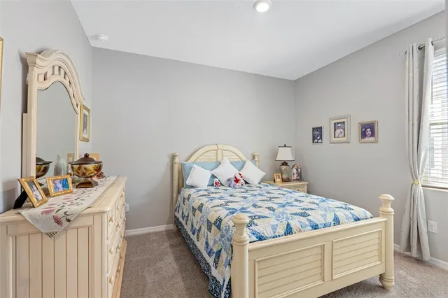 a view of a house with backyard porch and garden