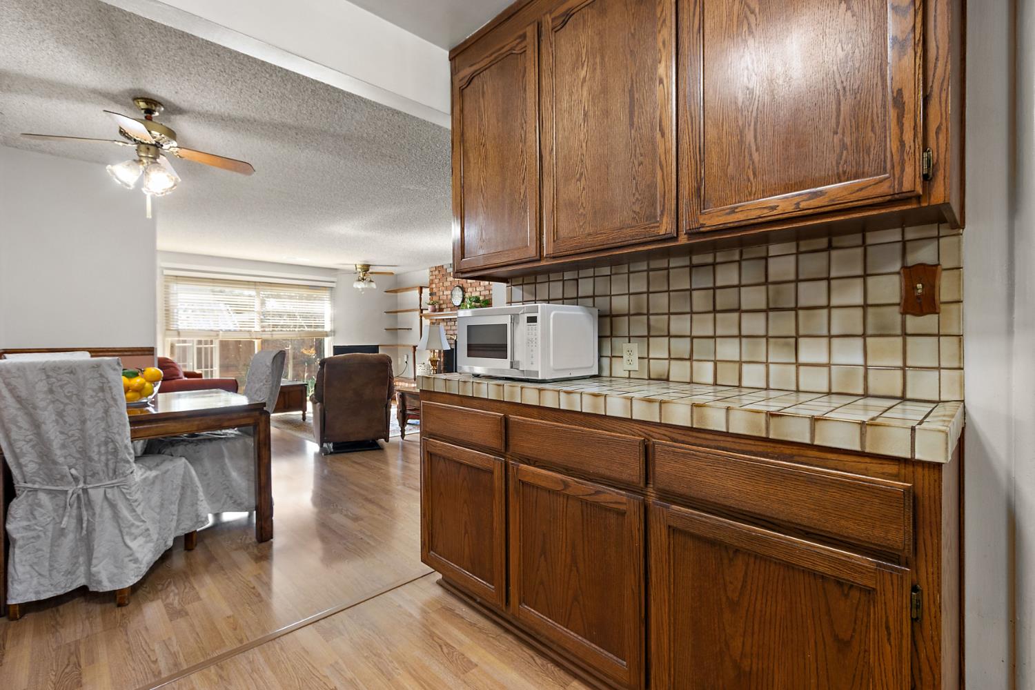 928 Jean Way Hayward, CA 94545 - Photo 15 of 36 a kitchen with stainless steel appliances granite countertop a sink dishwasher stove and cabinets