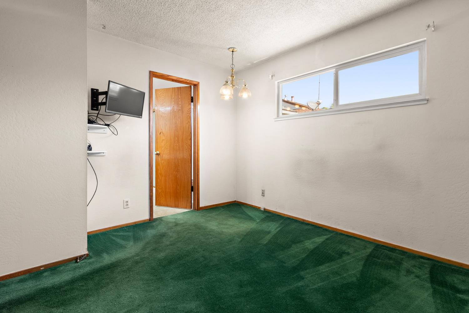 928 Jean Way Hayward, CA 94545 - Photo 21 of 36 a view of a room with rack on the wall