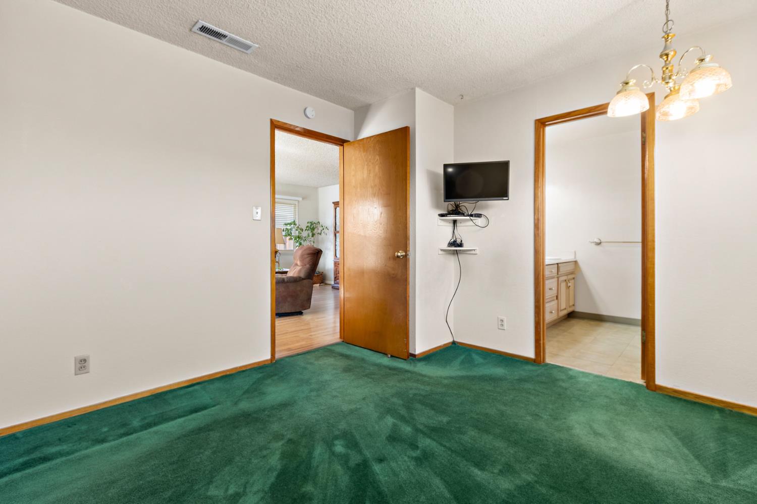 928 Jean Way Hayward, CA 94545 - Photo 22 of 36 a view of a livingroom with a flat screen tv