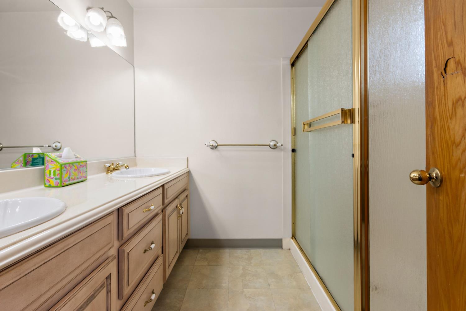 928 Jean Way Hayward, CA 94545 - Photo 23 of 36 a bathroom with a granite countertop sink a toilet and a shower