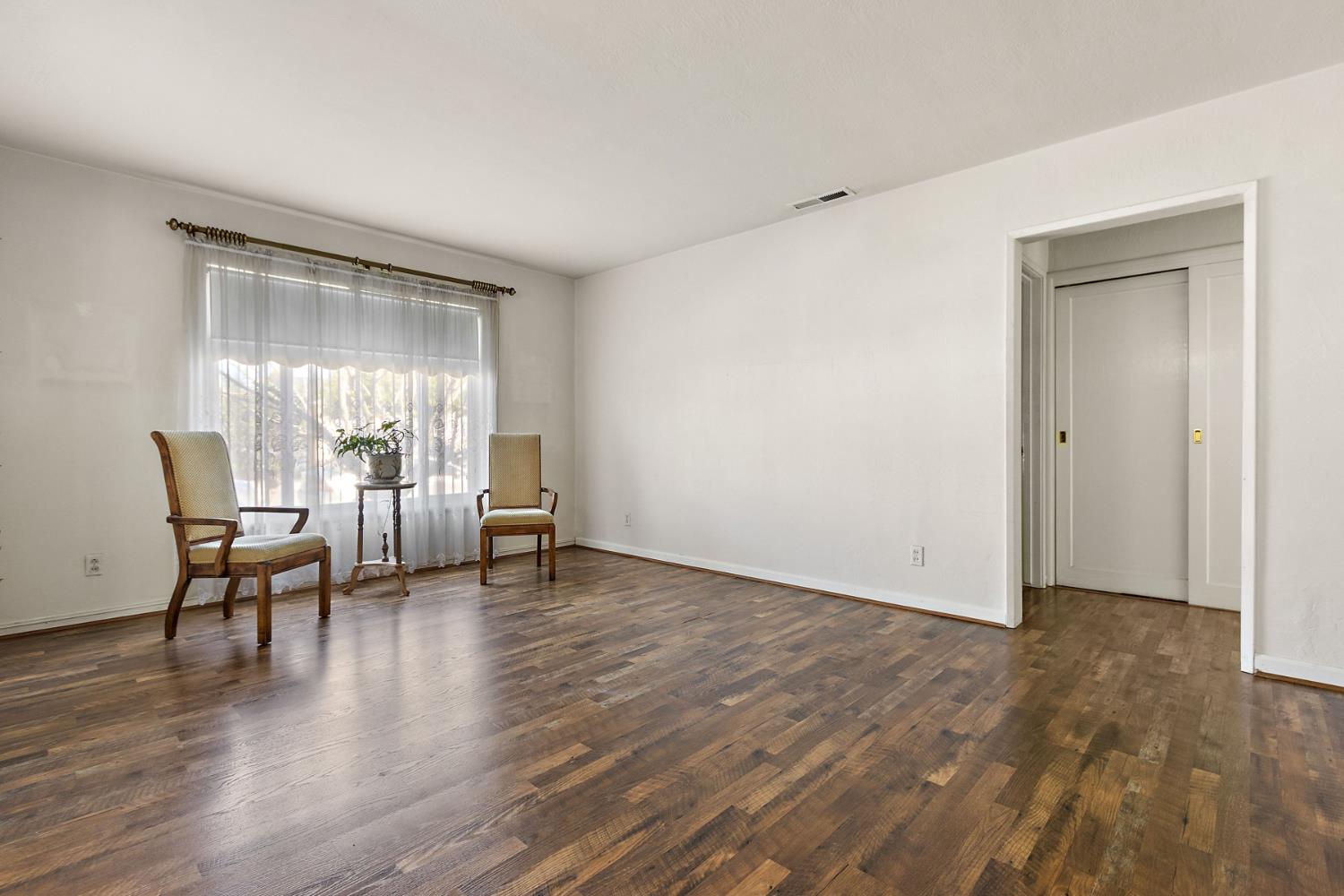 928 Jean Way Hayward, CA 94545 - Photo 25 of 36 a view of work space with wooden floor and a window