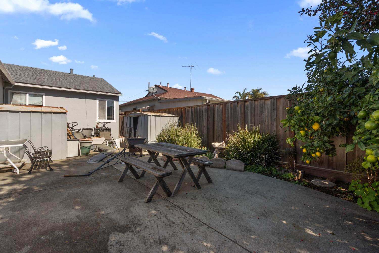 928 Jean Way Hayward, CA 94545 - Photo 36 of 36 a view of a patio with table and chairs and potted plants