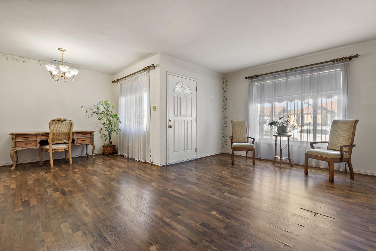 928 Jean Way Hayward, CA 94545 - Photo 7 of 36 a living room with furniture and a wooden floor