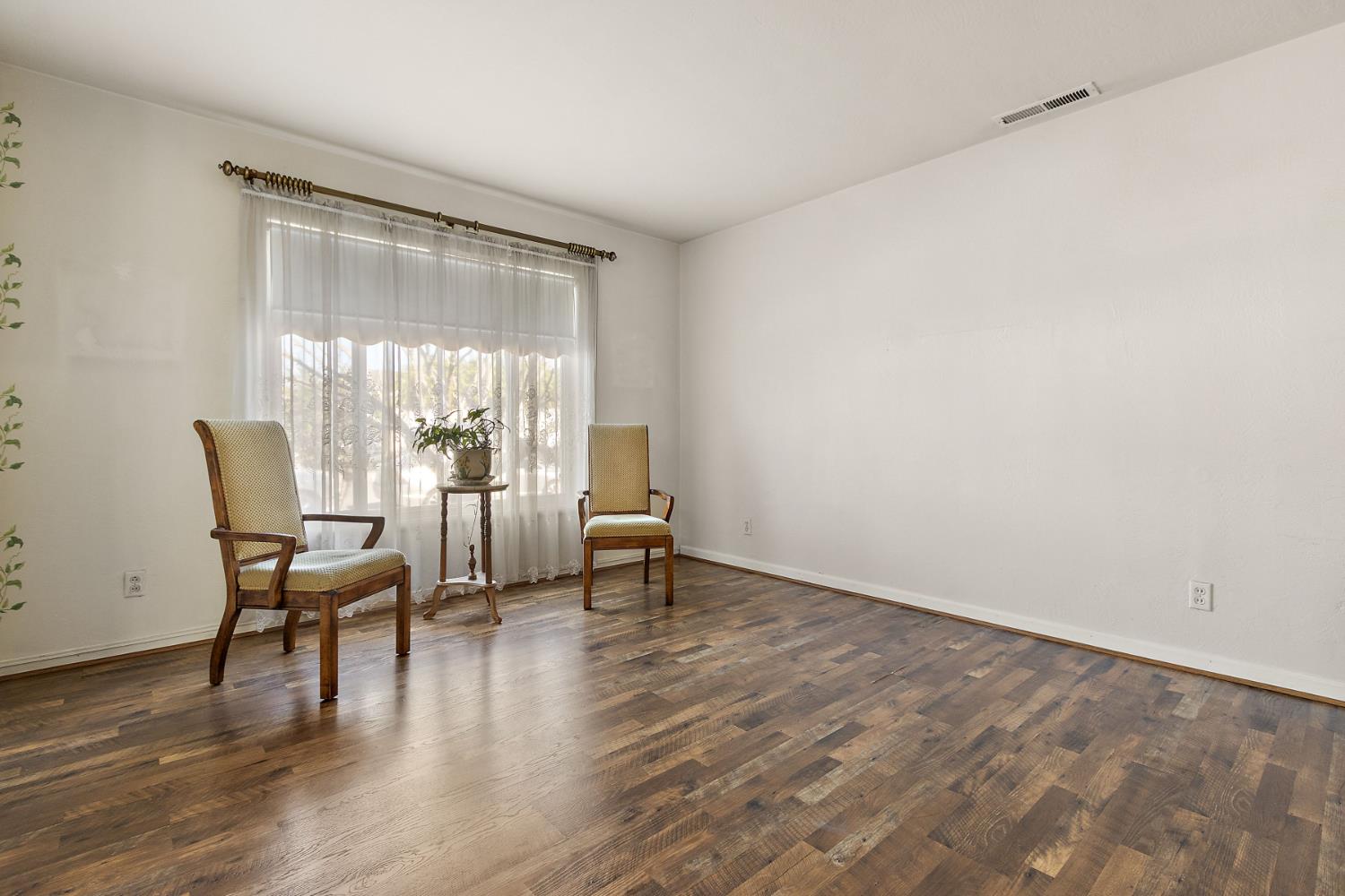 928 Jean Way Hayward, CA 94545 - Photo 8 of 36 a view of a room with furniture and wooden floor