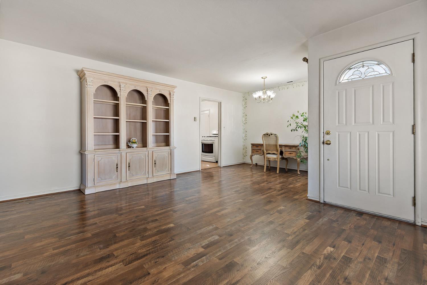 928 Jean Way Hayward, CA 94545 - Photo 9 of 36 a view of a livingroom with wooden floor and furniture