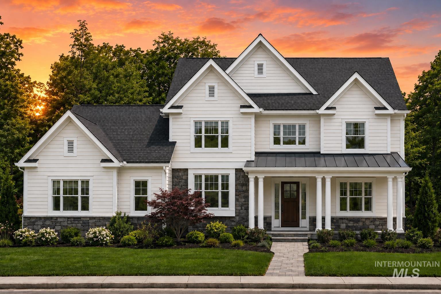 Tbd Lot 5 Tbd Boise, ID 83713 - Photo 1 of 6 White siding exterior with dark stone accents, featuring a prominent covered porch supported by white columns